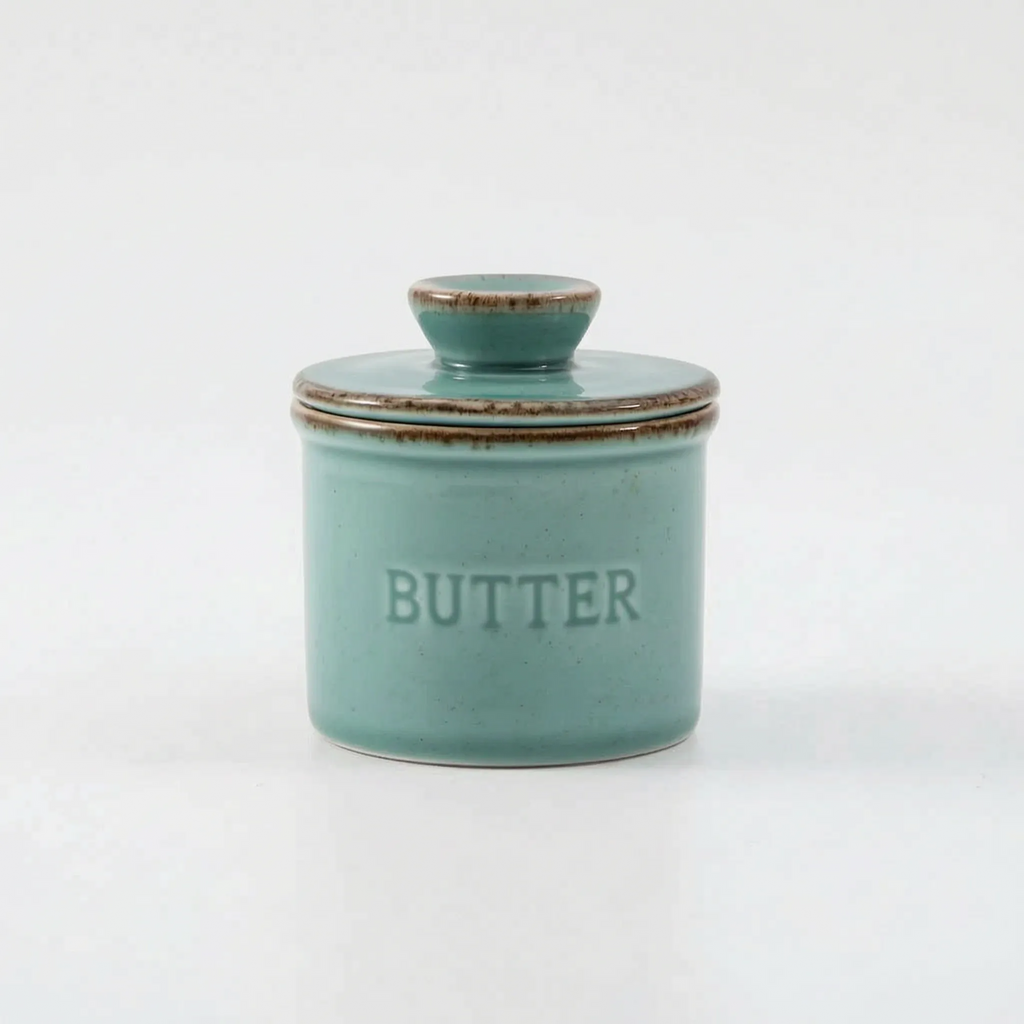  French Butter Crock – Speckled Stoneware Keeper in a turqoise in a white studio. 