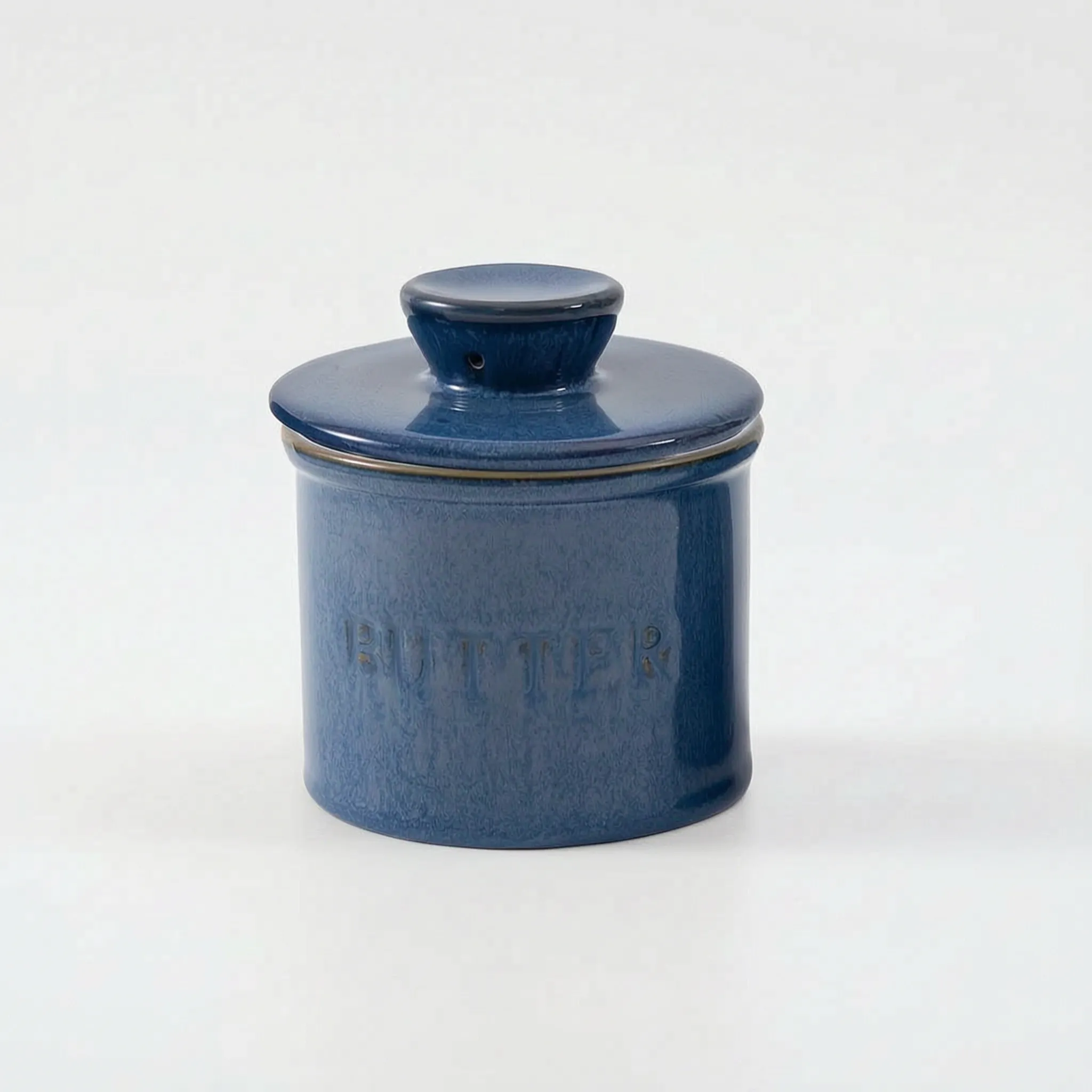  French Butter Crock – Speckled Stoneware Keeper in bright blue in a nice white studio. 