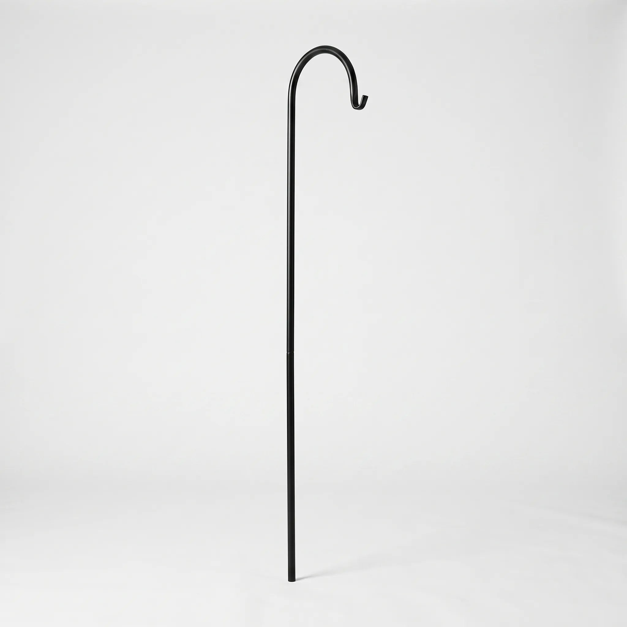 Black shepherd's hook on a white background