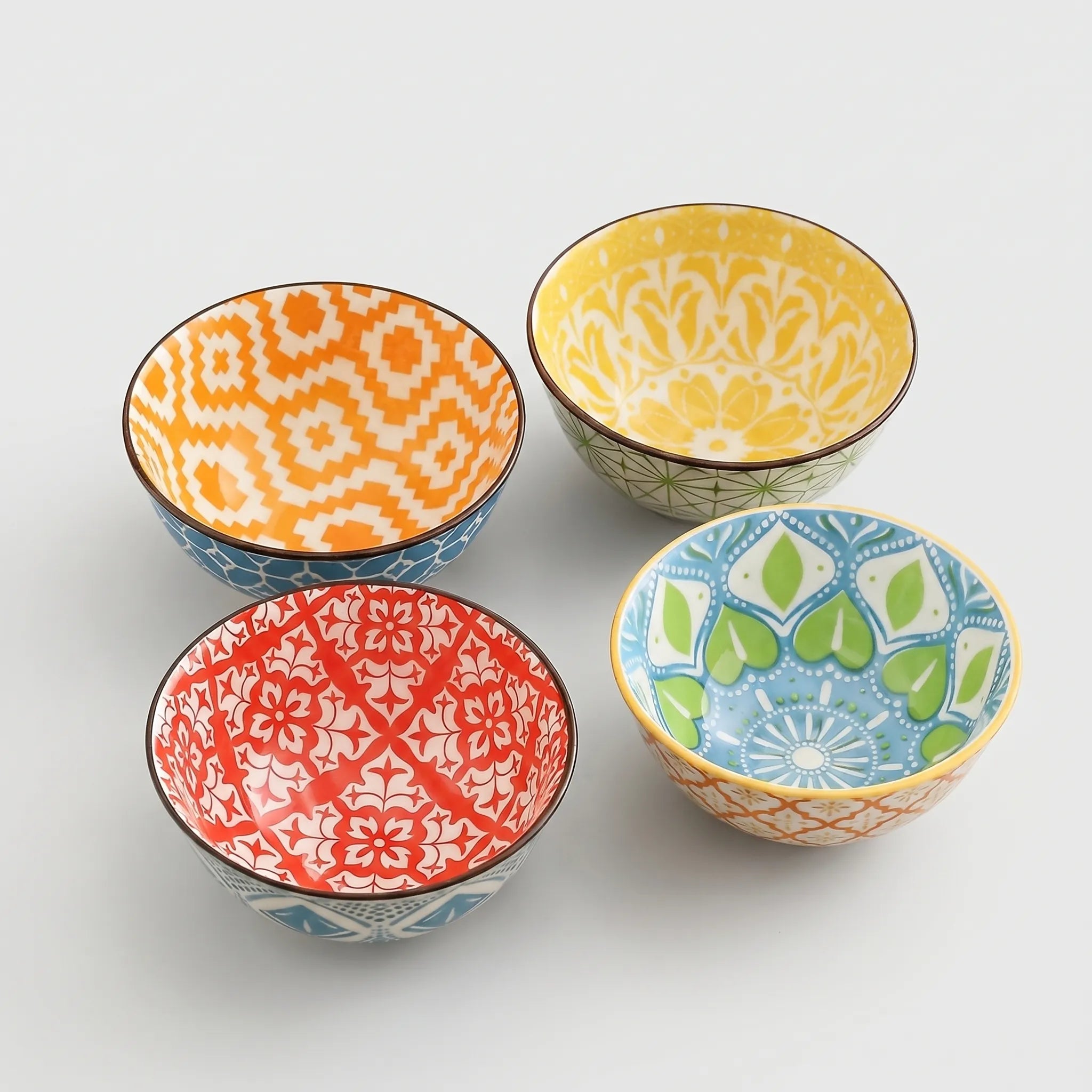 Patterned Ceramic Bowl Set in different nice colors in a nice white studio. 