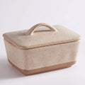 Speckled Stoneware Butter Dish – Cream with Lid in a nice white studio,