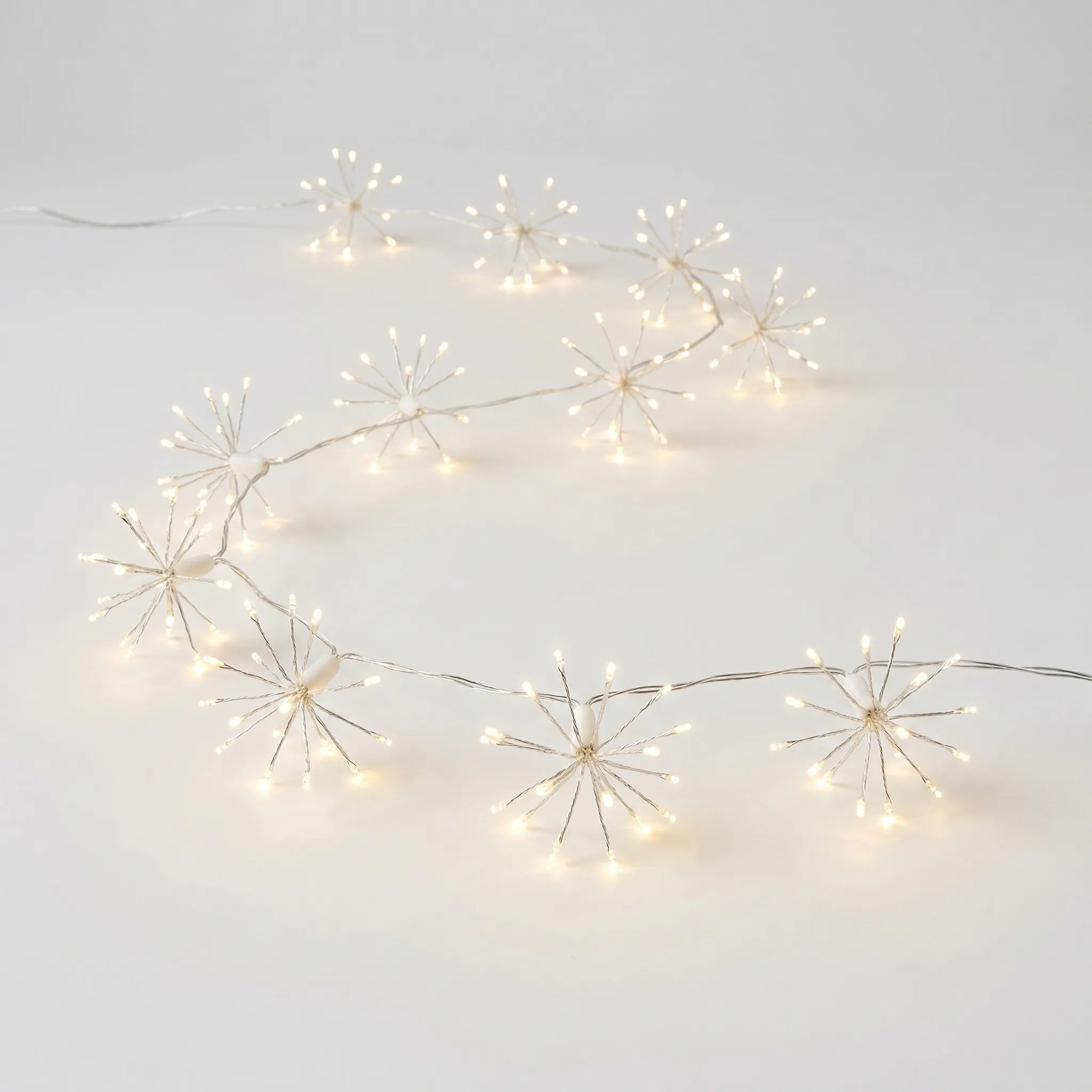 Starburst String Lights  in a white studio.