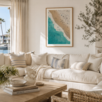 Nice coastal living room with a beautiful poster of beach with people on it. 