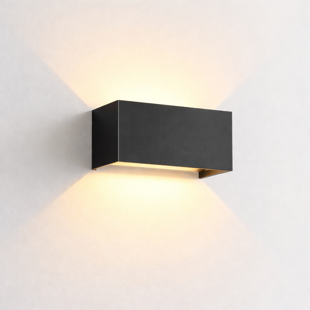 Modern wall-mounted light fixture on a white background