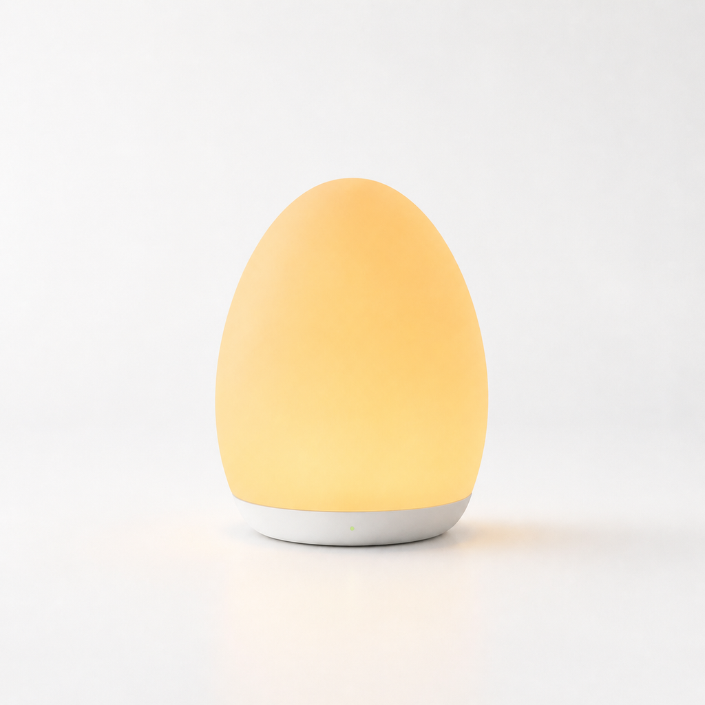 Yellow egg-shaped lamp on a white background