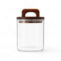 Cylindrical glass canister with wooden lid for pantry and kitchen storage