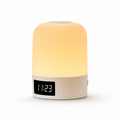 Yellow night light with digital clock on a white background
