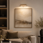 Living room with a framed artwork on the wall, sofa, and decorative elements.