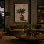Cozy living room with a brown sofa, wooden coffee table, and wall art of a potted plant.