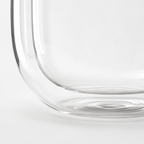 Clear glass tumbler on a white background