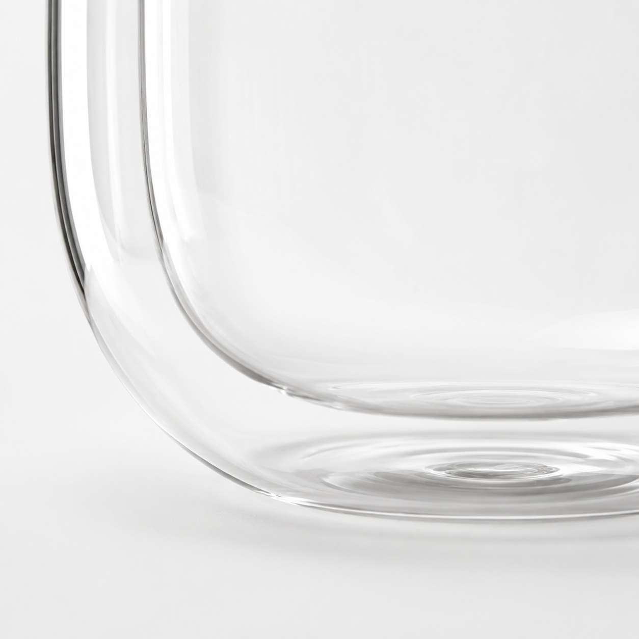 Clear glass tumbler on a white background