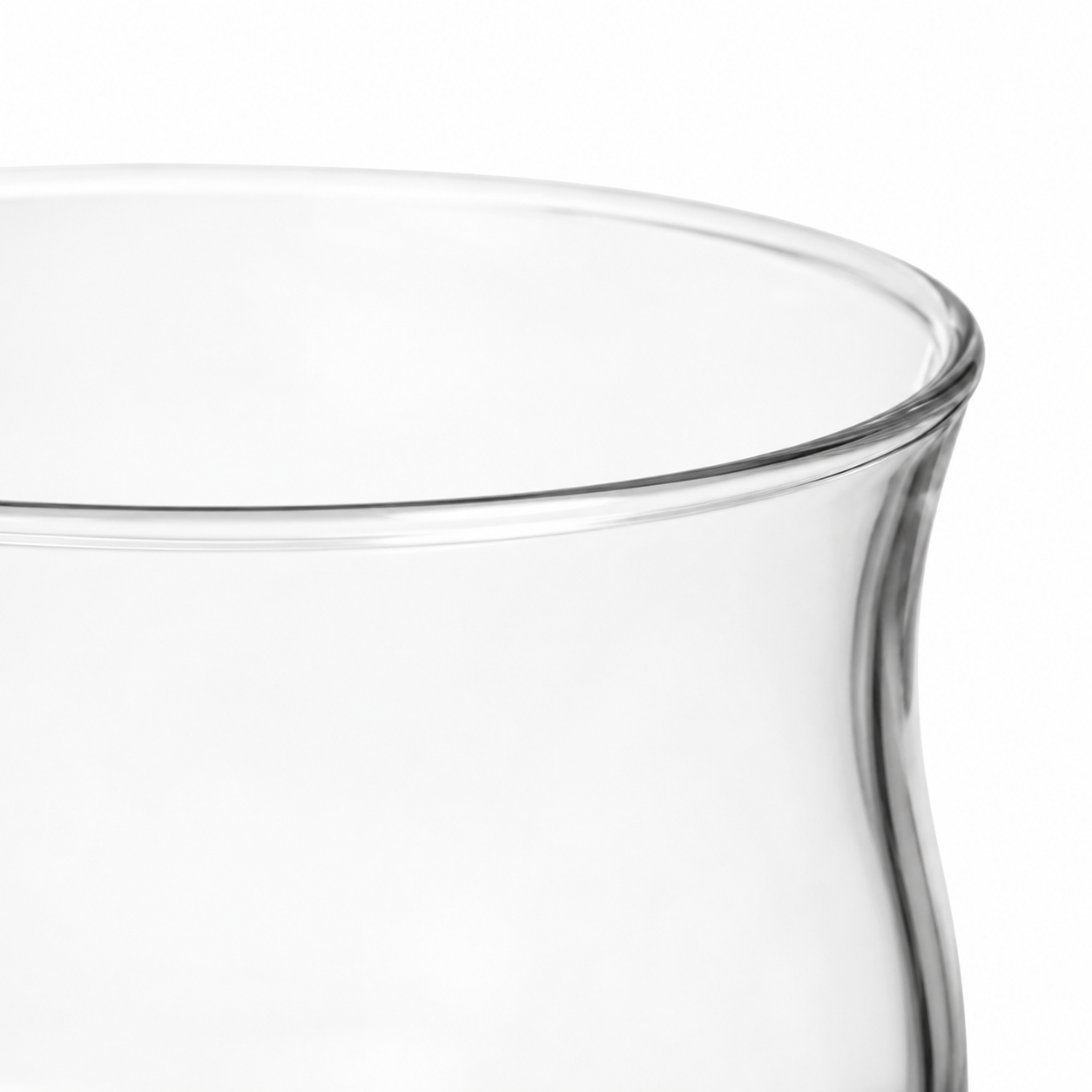 Close-up of a clear glass on a white background
